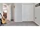 Spacious bedroom with a large closet and carpet flooring at 1034 Corso Dr, Winter Haven, FL 33884