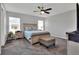Spacious bedroom with carpeted floor and large bed at 1034 Corso Dr, Winter Haven, FL 33884