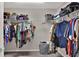 Large walk-in closet with double hanging rods at 1034 Corso Dr, Winter Haven, FL 33884