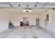 Two-car garage with ample space for storage and tools at 1034 Corso Dr, Winter Haven, FL 33884