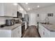 Modern kitchen with stainless steel appliances and an island at 1034 Corso Dr, Winter Haven, FL 33884