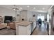Open concept kitchen with island and living room view at 1034 Corso Dr, Winter Haven, FL 33884