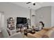 Open concept living room with hardwood floors and neutral decor at 1034 Corso Dr, Winter Haven, FL 33884