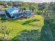 House with pool and large backyard, aerial view at 111 Arbor Way, Auburndale, FL 33823