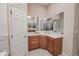 Bathroom boasts a corner vanity and ample storage at 111 Arbor Way, Auburndale, FL 33823