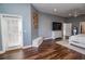 Main bedroom with large windows and a view at 111 Arbor Way, Auburndale, FL 33823