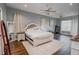 Main bedroom with a large bed and plenty of natural light at 111 Arbor Way, Auburndale, FL 33823