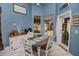 Casual breakfast nook with a round table and built-in cabinetry at 111 Arbor Way, Auburndale, FL 33823
