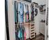 Walk-in closet with ample shelving and hanging space at 111 Arbor Way, Auburndale, FL 33823