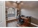 Home office with built-in window seat and wood floors at 111 Arbor Way, Auburndale, FL 33823