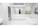 Bathroom with double vanity, soaking tub, and separate shower at 1520 Royal Forest Loop, Lakeland, FL 33811