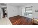 Spacious living room with hardwood floors and access to a patio at 1520 Royal Forest Loop, Lakeland, FL 33811