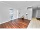 Bright living area with hardwood floors and sliding glass doors at 1520 Royal Forest Loop, Lakeland, FL 33811