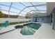 Relaxing pool and screened enclosure perfect for outdoor enjoyment at 1520 Royal Forest Loop, Lakeland, FL 33811
