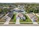 Aerial view showing a desirable home in a quiet residential neighborhood at 1655 Laurel Oaks Dr, Bartow, FL 33830