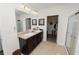 Main bathroom with double sinks and large walk-in shower at 1655 Laurel Oaks Dr, Bartow, FL 33830