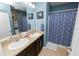 Guest bathroom with double vanity and shower/tub combo at 1655 Laurel Oaks Dr, Bartow, FL 33830
