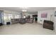 Bright and airy living room featuring a sectional sofa and access to the kitchen at 1655 Laurel Oaks Dr, Bartow, FL 33830
