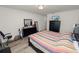 King-size bed, dresser, and large mirror in bright bedroom at 1655 Laurel Oaks Dr, Bartow, FL 33830