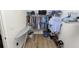 Well-organized walk-in closet with shelving and hanging rods at 1655 Laurel Oaks Dr, Bartow, FL 33830