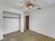 Bedroom with closet, ceiling fan and neutral decor at 1704 Pineberry Ct, Lakeland, FL 33803