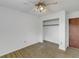 Bedroom with closet, ceiling fan and neutral decor at 1704 Pineberry Ct, Lakeland, FL 33803