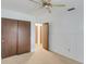Bedroom with double closets and access to bathroom at 1704 Pineberry Ct, Lakeland, FL 33803