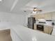 Kitchen with stainless steel appliances and white countertops at 1704 Pineberry Ct, Lakeland, FL 33803