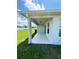 Covered patio with access from house at 2300 Crossandra St, Mascotte, FL 34753