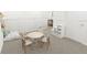 Bright playroom featuring a round table and chairs, plus ample storage at 2327 Northumberland Ct, Haines City, FL 33844