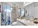 Bathroom with single vanity and walk-in shower at 241 Walkers Point Dr, Auburndale, FL 33823
