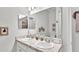 Modern bathroom with double vanity and updated fixtures at 241 Walkers Point Dr, Auburndale, FL 33823