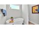 Relaxing bathroom with a free-standing bathtub at 241 Walkers Point Dr, Auburndale, FL 33823