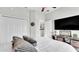 Guest bedroom with a queen-size bed and built-in shelving at 241 Walkers Point Dr, Auburndale, FL 33823