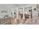 Open concept entryway, hardwood floors, and views into the living room at 241 Walkers Point Dr, Auburndale, FL 33823
