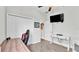 Spacious home office with desk, chair, and ample closet space at 241 Walkers Point Dr, Auburndale, FL 33823