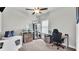 Bright home office features built-in shelving and a comfortable workspace at 241 Walkers Point Dr, Auburndale, FL 33823
