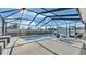 Relaxing screened pool area with patio furniture at 241 Walkers Point Dr, Auburndale, FL 33823
