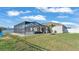 Enclosed pool area with a spa and fenced backyard at 241 Walkers Point Dr, Auburndale, FL 33823