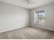 Bright bedroom with neutral walls and carpet flooring at 416 Monticelli Dr, Haines City, FL 33844
