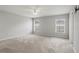 Bright bedroom featuring new carpeting and ceiling fan at 416 Monticelli Dr, Haines City, FL 33844