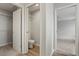 Hallway with closet, toilet and access to bedrooms at 416 Monticelli Dr, Haines City, FL 33844