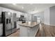 Modern kitchen with stainless steel appliances and island at 416 Monticelli Dr, Haines City, FL 33844