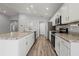 Modern kitchen with stainless steel appliances and island at 416 Monticelli Dr, Haines City, FL 33844