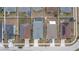 Aerial top-down view of houses with pools and solar panels at 416 Monticelli Dr, Haines City, FL 33844
