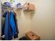 Well-organized closet with shelving and hanging rods at 4241 Oak Loop # 36, Mulberry, FL 33860