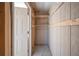Empty storage room with built-in shelving and overhead lighting at 4243 Oak Loop # 35, Mulberry, FL 33860