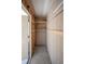 Empty storage room with built-in shelving and overhead lighting at 4243 Oak Loop # 35, Mulberry, FL 33860