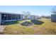 Large backyard with shed and screened porch at 4307 Meadow Ridge Ct, Mulberry, FL 33860