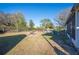 Backyard view, showing a fire pit and shed at 4307 Meadow Ridge Ct, Mulberry, FL 33860
